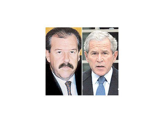 Eduardo Arnold y George W. Bush