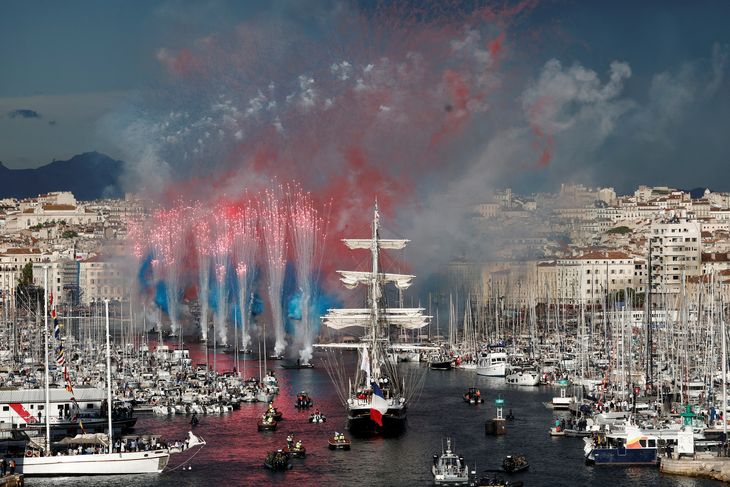 The Olympic torch arriving in Marseille aboard the Belem. The Olympic torch arriving in Marseille aboard the Belem.