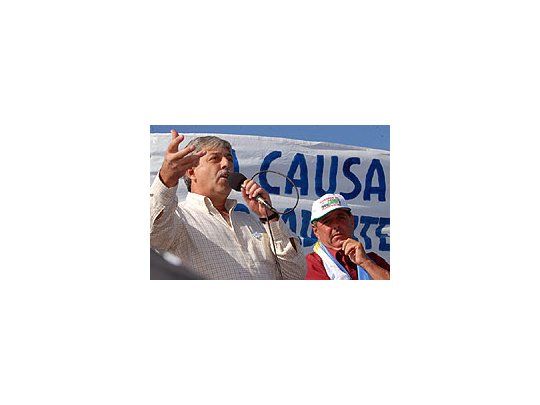 Eduardo Buzzi y Alfredo De Angeli durante el acto central en Entre Ríos.