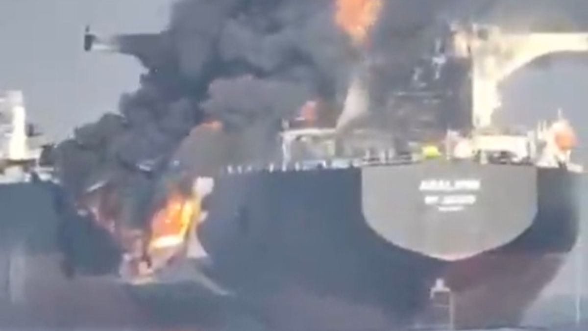 Two oil ships collided in a strategic channel and caught fire