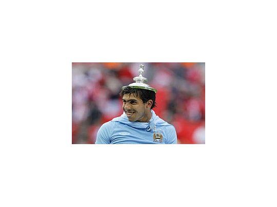 Manchester City quiere retener al argentino Carlos Tevez.