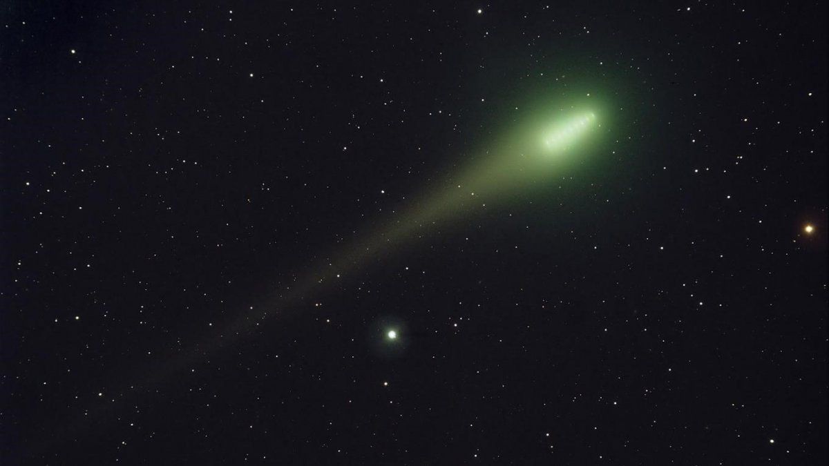 An unusual green comet will pass by the Earth when to see the