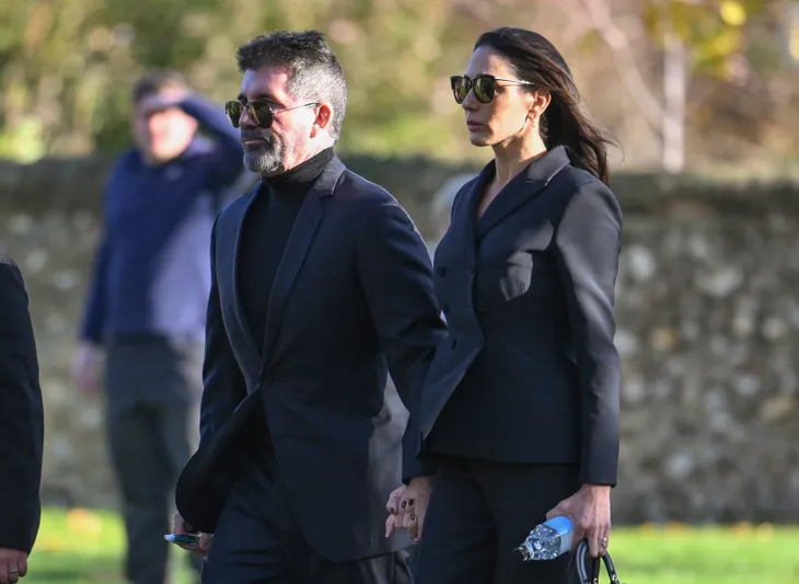 Simon Cowell and Lauren Silverman. Simon Cowell and Lauren Silverman.