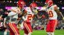 Kansas City Chiefs at the 2023 Super Bowl, dressed in white. Kansas City Chiefs at the 2023 Super Bowl, dressed in white.