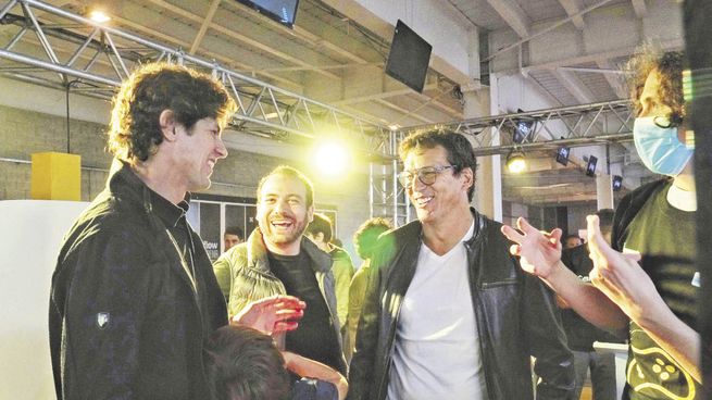 Juego. Martín Lousteau, Tomás Mestre y José Luis Giusti, en Tecnópolis.