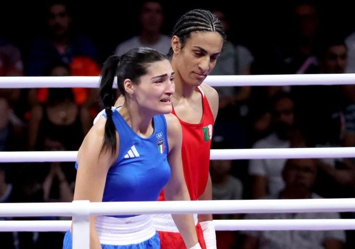 Italy's Angela Carini cries after retiring against Algerian boxer Imane Khelif, at the centre of the controversy surrounding the participation of hyperandrogynous women in the Paris 2024 Olympic Games. Italy's Angela Carini cries after retiring against Algerian boxer Imane Khelif, at the centre of the controversy surrounding the participation of hyperandrogynous women in the Paris 2024 Olympic Games.