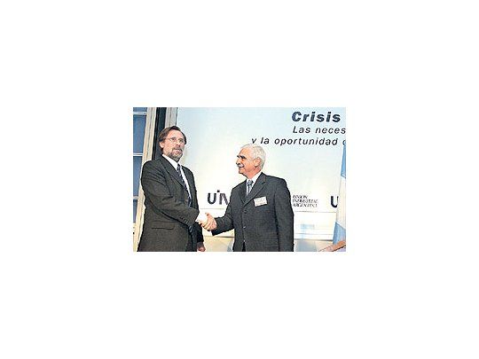 CarlosFernándezy el titularde la UIA,Juan CarlosLascurain.Ayer elministrorepresentóal gobierno,pero hoyestará enPilarCristina deKirchner.