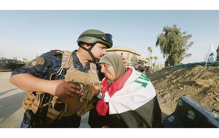 ámbito.com | EMOCIÓN. La llegada de las tropas regulares iraquíes causó júbilo en la castigada población de Mosul.