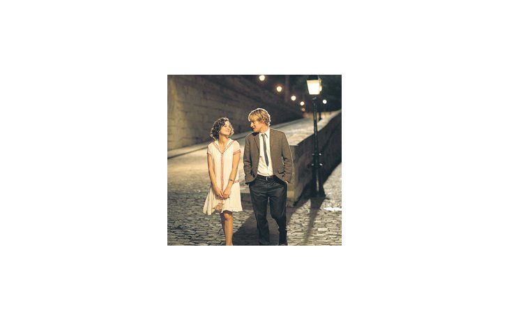 ámbito.com | Viajeros del tiempo: Marion Cotillard y Owen Wilson, en una de sus caminatas a orillas del Sena en «Medianoche en París», de Woody Allen.