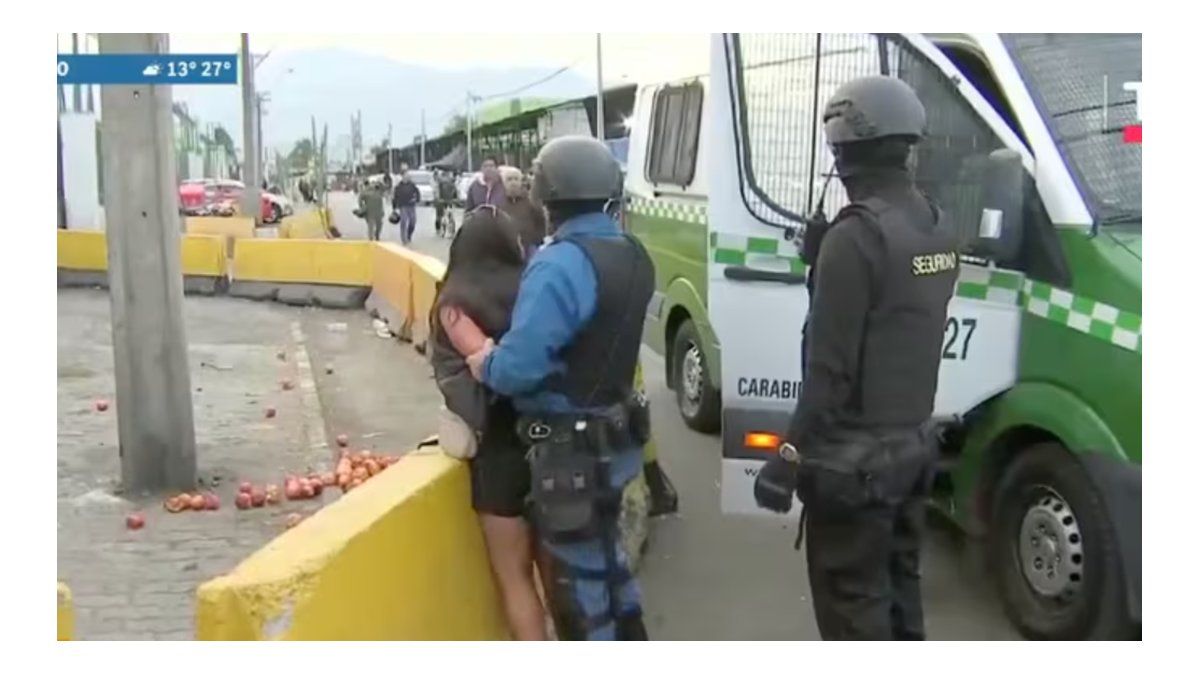 They arrested her, she took the gun from a guard and started shooting