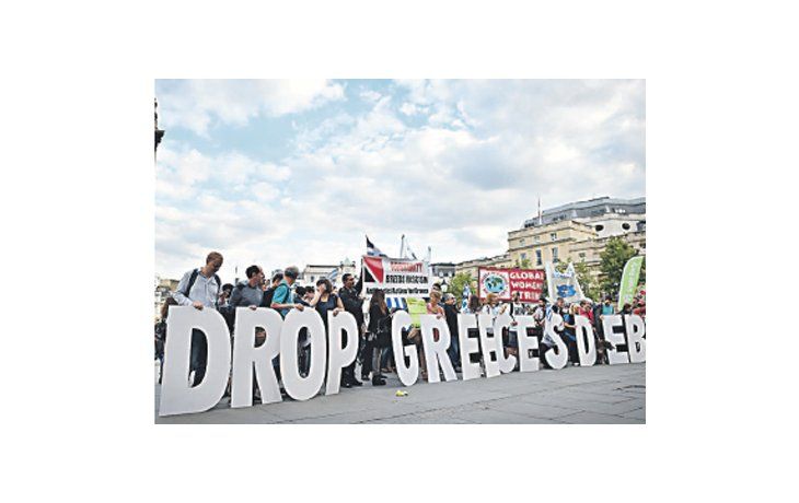 Manifestantes se reunieron ayer en Londres, en Trafalgar Square, para mostrarse en solidaridad con Grecia y contra el ajuste.