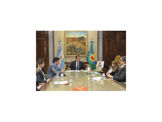 Juntos. El gobernador y su vice en una audiencia en la Casa de Gobierno provincial.