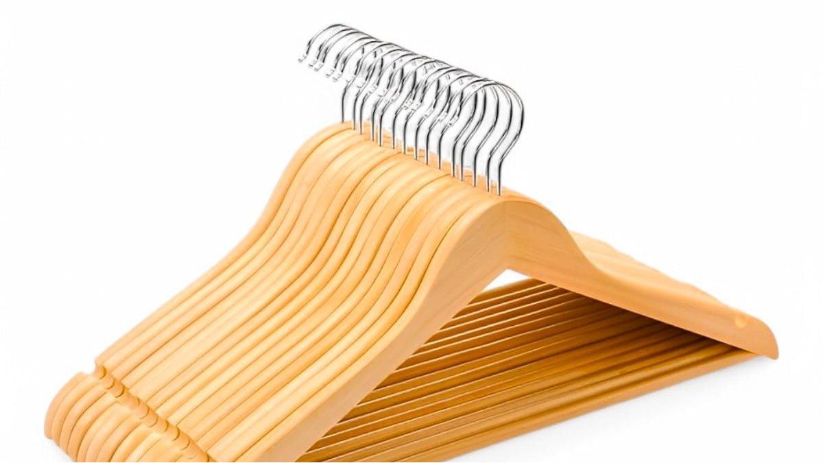 If you have wooden hangers, you can renew them and turn them into a design corner table