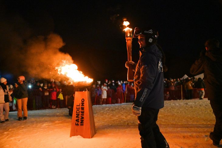 The athletes lit the cauldron. The athletes lit the cauldron.