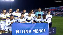 a un dia del veredicto en el juicio a villa, boca salio a la cancha con una bandera del ni una menos