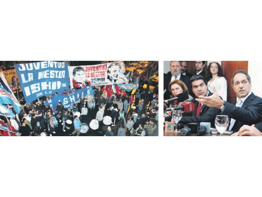 Daniel Scioli y Jorge Capitanich, ayer durante la conferencia poscumbre. Afuera, arrimados por Mario Ishii, hacían ruido militantes de La Néstor.