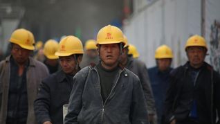 La industria china creció al menor ritmo en 12 meses.
