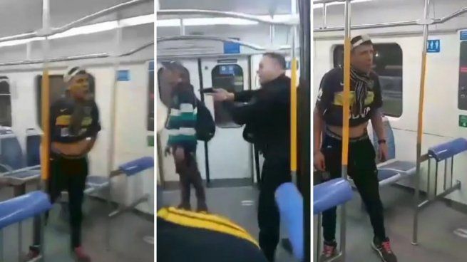 El hincha de Boca, al momento de ser demorado en el tren Roca
