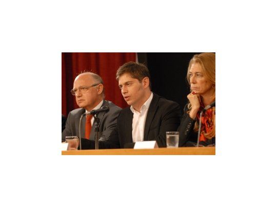 El canciller Héctor Timerman, el ministro de Economía, Axel Kicillof y su par de Industria, Débora Giorgi.