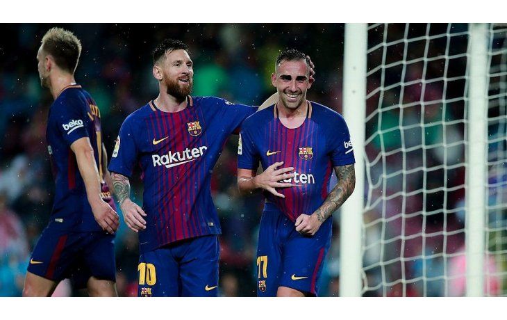 Messi festeja con Paco Alcácr, autor de los dos goles de Barcelona (Foto: @ChampionsLeague).