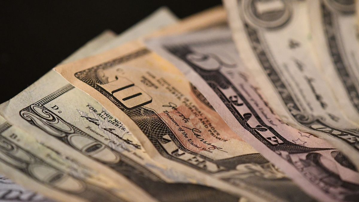 The dollar rose slightly and was one step away from 