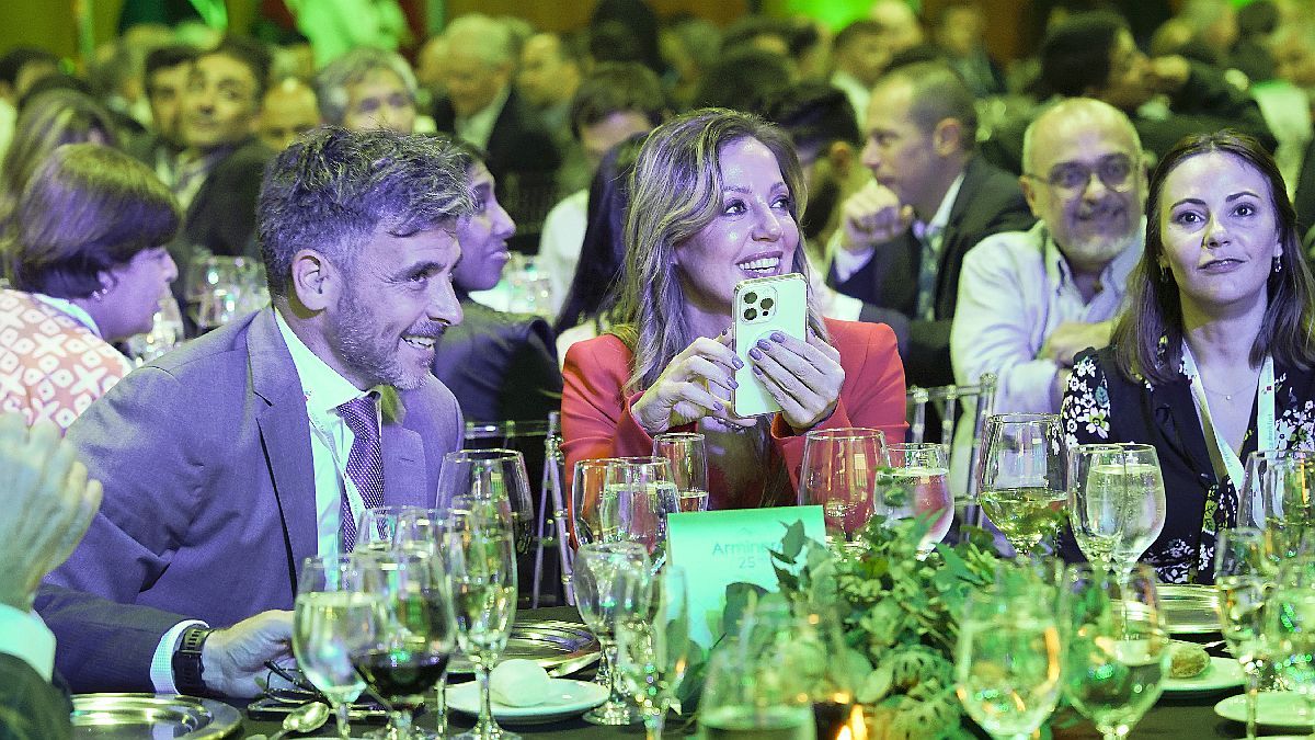 ribbon cutting, dinner with businessmen and crossed darts