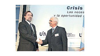 ámbito.com | CarlosFernándezy el titularde la UIA,Juan CarlosLascurain.Ayer elministrorepresentóal gobierno,pero hoyestará enPilarCristina deKirchner.