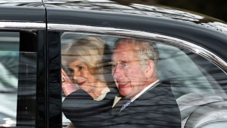 King Charles III greeted the public smilingly from his vehicle. King Charles III greeted the public smilingly from his vehicle.