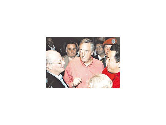 Paolo Rocca, Néstor Kirchner y Hugo Chávez un año atrás, antes de que el venezolano tomara el control operativo de Sidor.