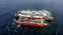 El proyecto Argentina LNG busca monetizar los enormes recursos gasíferos de Vaca Muerta mediante un esquema de licuefacción escalonado que combinará unidades flotantes (FLNG) con futuras instalaciones terrestres