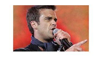 Williams volvió a alentar rumores de reunión con su ex grupo, Take That.