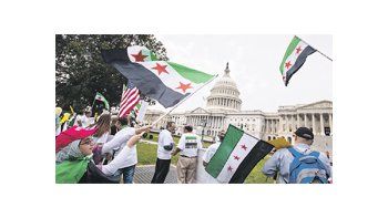 ámbito.com | Simpatizantes de la oposición a Bashar al Asad se manifestaron ayer frente al Congreso en Washington en favor de un ataque militar contra el régimen sirio. Un sentimiento que no comparte la mayoría de los estadounidenses.