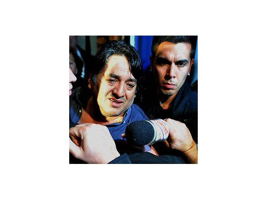 Servero al salir de su domicilio.