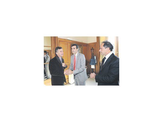 Mauricio Macri, Florencio Randazzo y Daniel Scioli, durante la reunión del viernes.