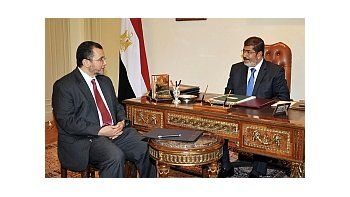 Qandil junto al presidente Mursi.