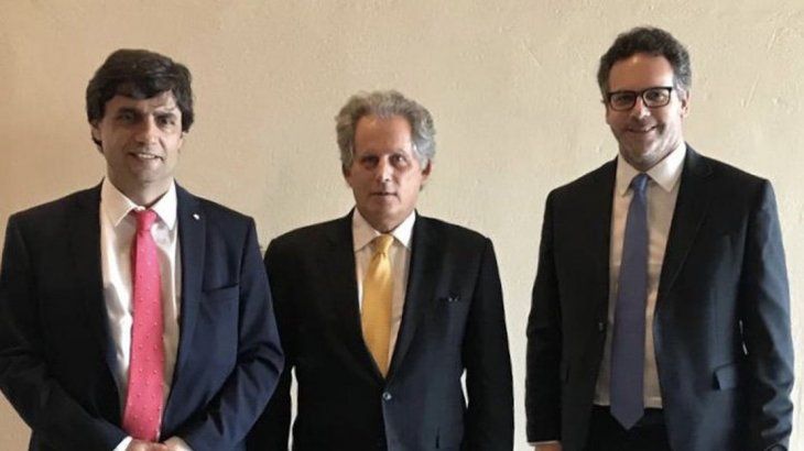 Hernán Lacunza, David Lipton y Guido Sandleris.