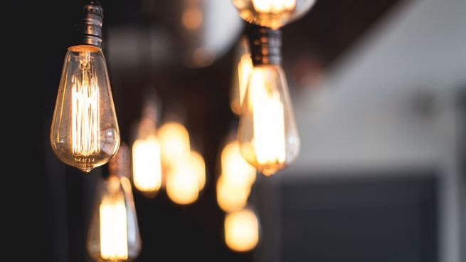 wide-selective-closeup-shot-of-illuminated-light-bulbs-hanging-from-ceiling.jpg
