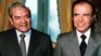 Economy Minister Erman González and President Carlos Menem. Economy Minister Erman González and President Carlos Menem.