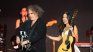 Robert Smith and Olivia Rodrigo. Robert Smith and Olivia Rodrigo.