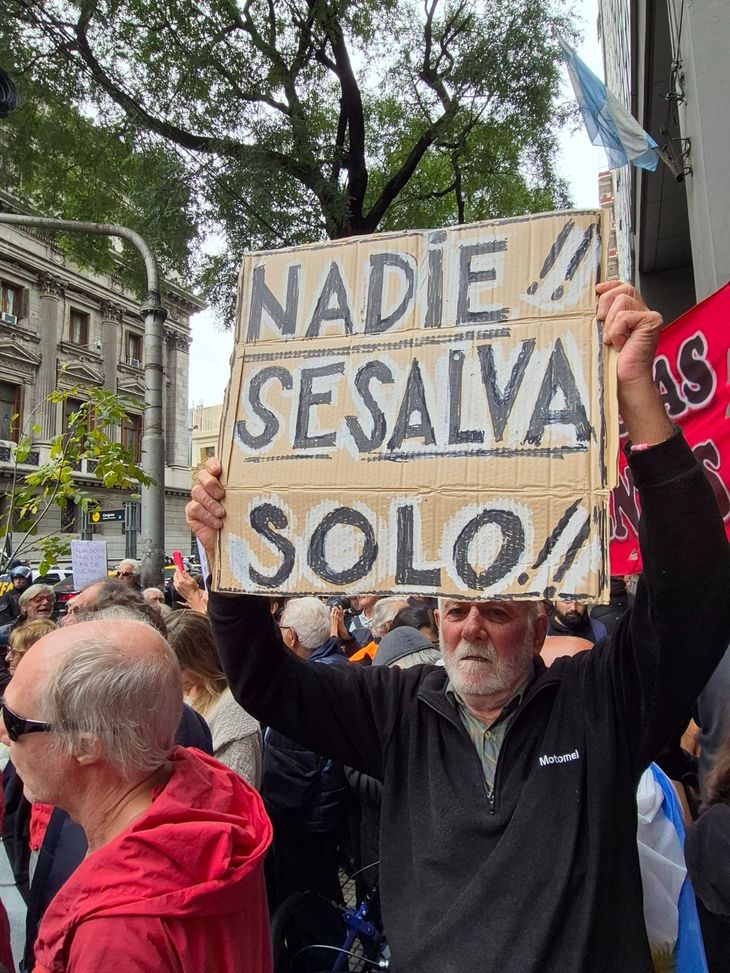 Many of the retirees brought posters with phrases that refer to the series.