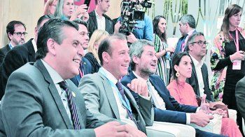 presencia. El gobernador de Neuqu&eacute;n, Omar Guti&eacute;rrez (centro) junto al ministro Mat&iacute;as Lammes, en Espa&ntilde;a.