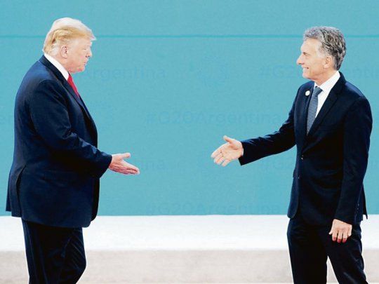 Saludo. M. Macri y D. Trump, el año pasado en el G-20 en Buenos Aires.
