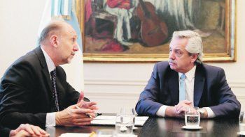 Omar Perotti y Alberto Fernández.