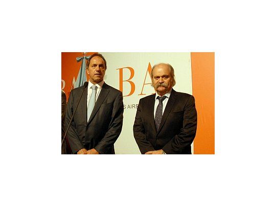 Alejandro Granados, junto a Daniel Scioli.