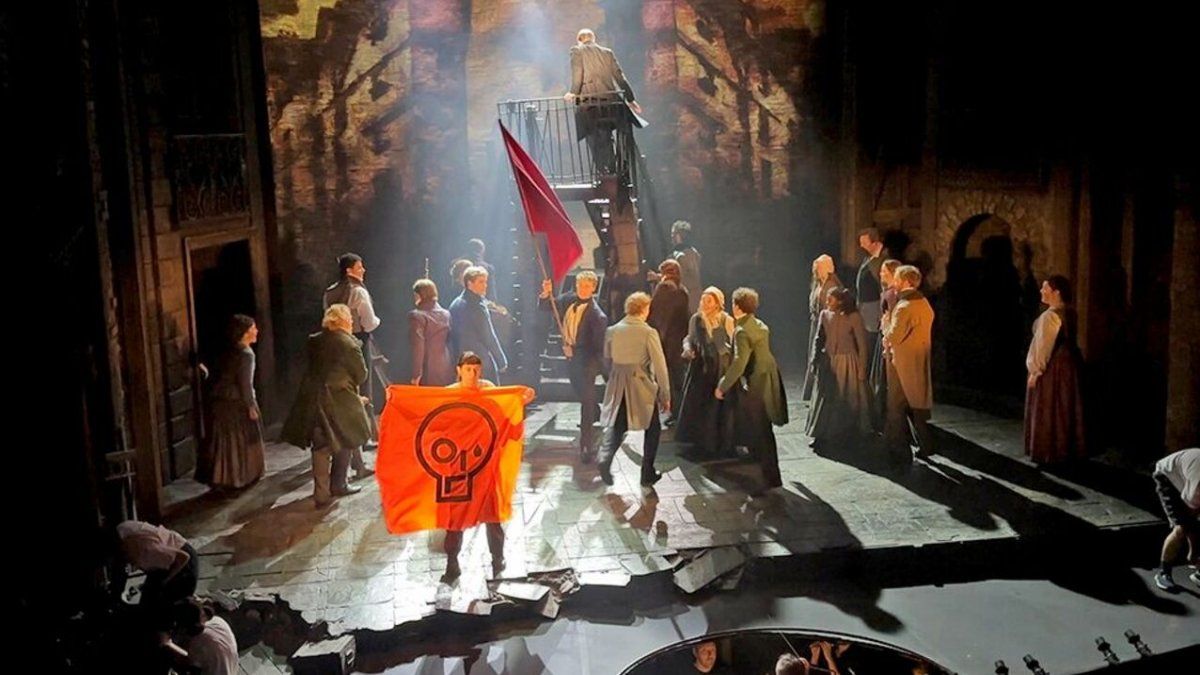 A group of activists chained themselves to the stage during the performance of Les Misérables