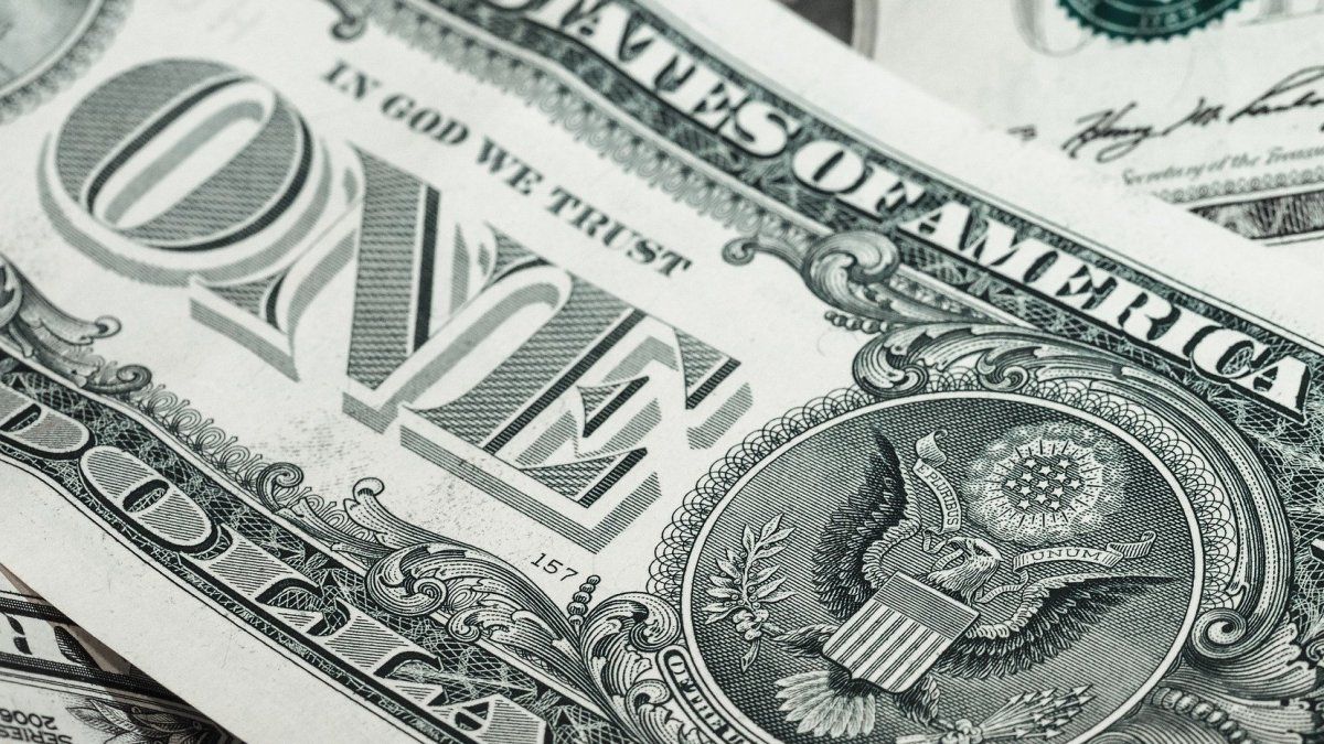 On a volatile day, the financial dollar falls for the second day in a row