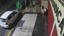 A man tapped the building's electronic board before the attack. A man tapped the building's electronic board before the attack.