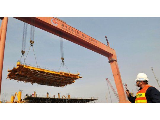 La economía de China se desaceleró en el segundo trimestre pero cumple previsiones