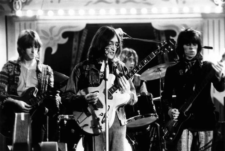 Eric Clapton, John Lennon, Mitch Mitchell and Keith Richards in The Dirty Mac. Eric Clapton, John Lennon, Mitch Mitchell and Keith Richards in The Dirty Mac.